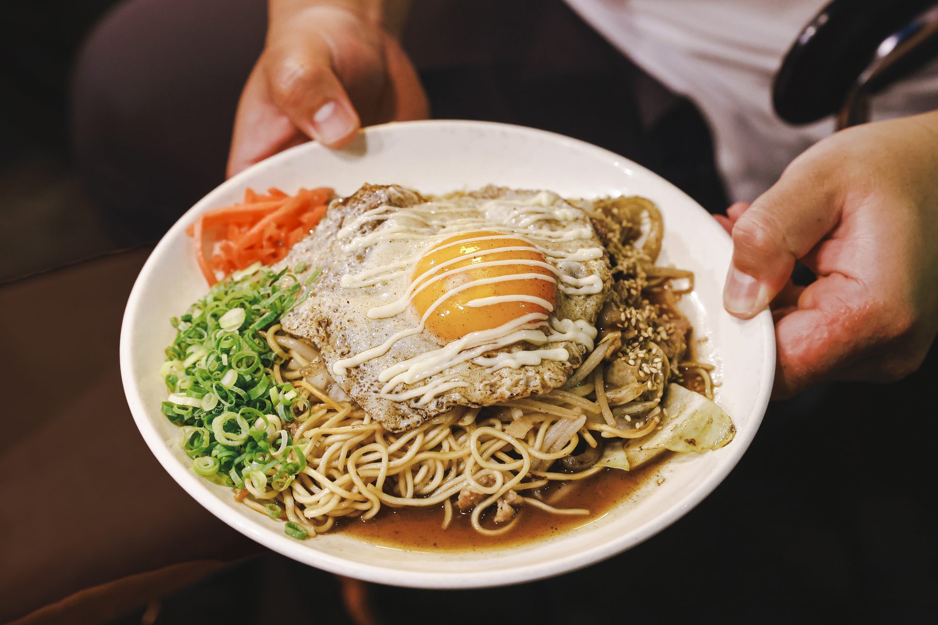 Yakisoba topped with a fried egg at a Fukuoka yatai
